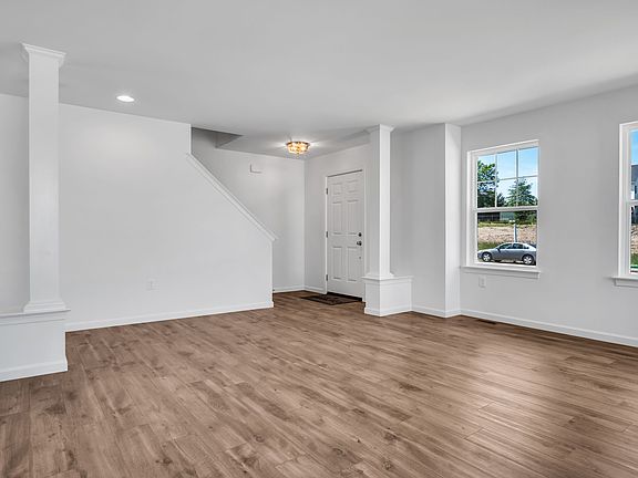 Living room with fireplace of the Charlotte Model from Garman Builders
