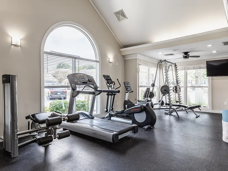 Achieve your goals in a fully equipped fitness space.