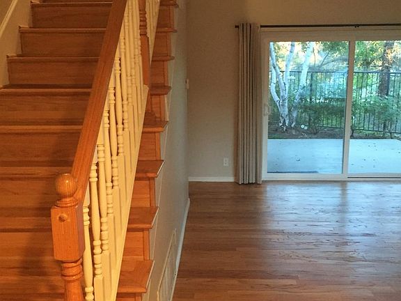 Entry way with stairs look down on living room