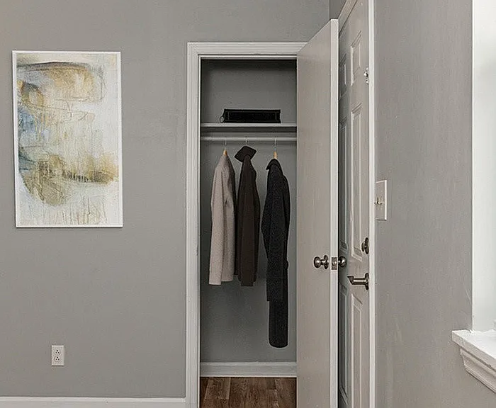 Explore stylish living with a modern closet designed for elegance and functionality.