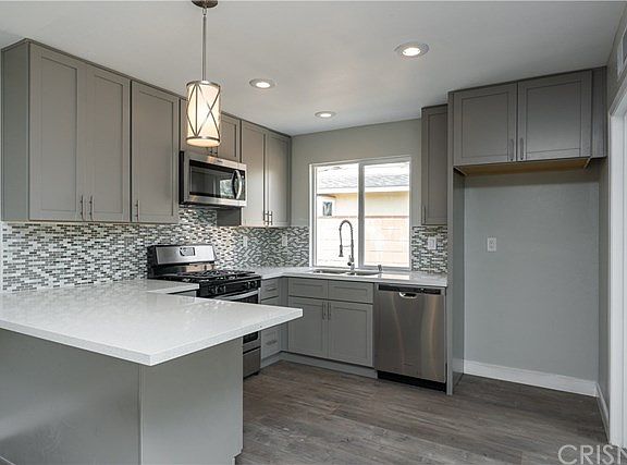 4th image of 9936 Odessa Ave