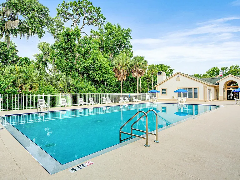 The Club at Sugar Mill Apartments — Photo 1
