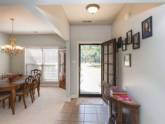 Lovely foyer is open to the dining room