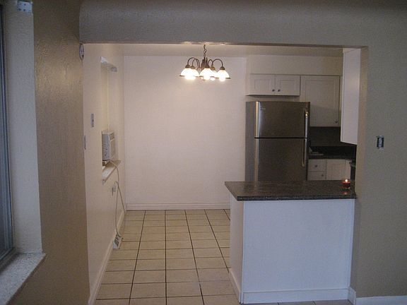 Dining area in large kitchen with A/C