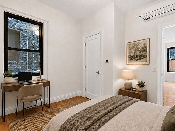 5th image of 302 E 12th St APT 4