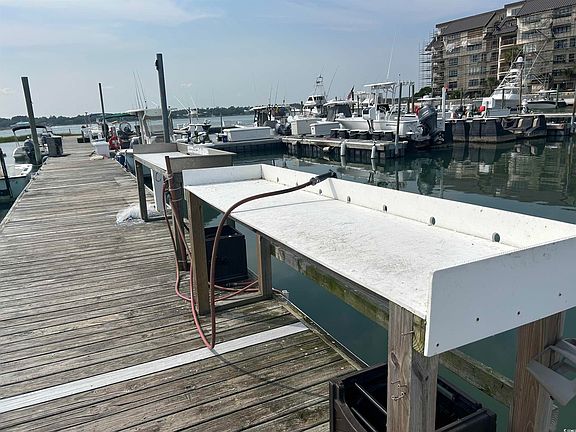 4th image of 1508 S Waccamaw Dr. Boat Slip #42 Marlin Quay Marina