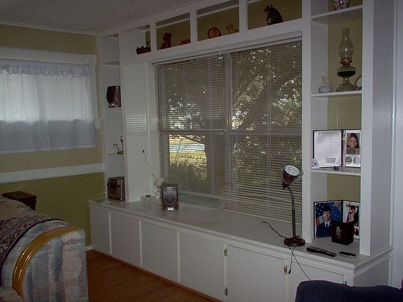 LR window surrounded by shelves