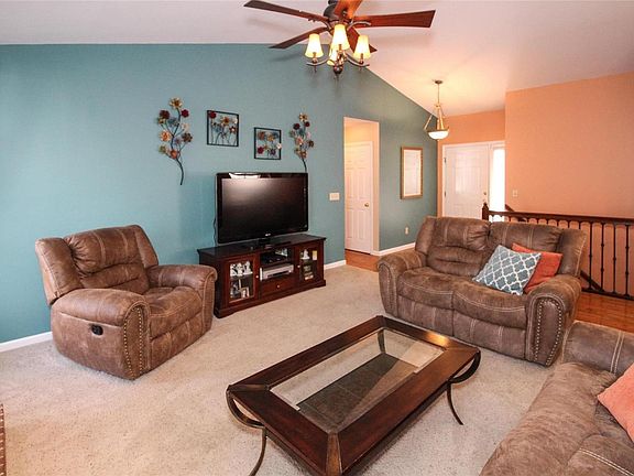 Vaulted great room to greet you!