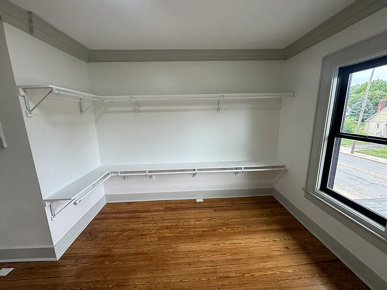 BEDROOM-SIZED primary walk-in closet!