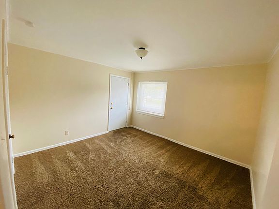 Back bedroom with egress door.
