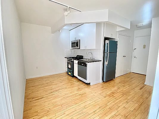 1st image of 319 E 8th St APT 4A