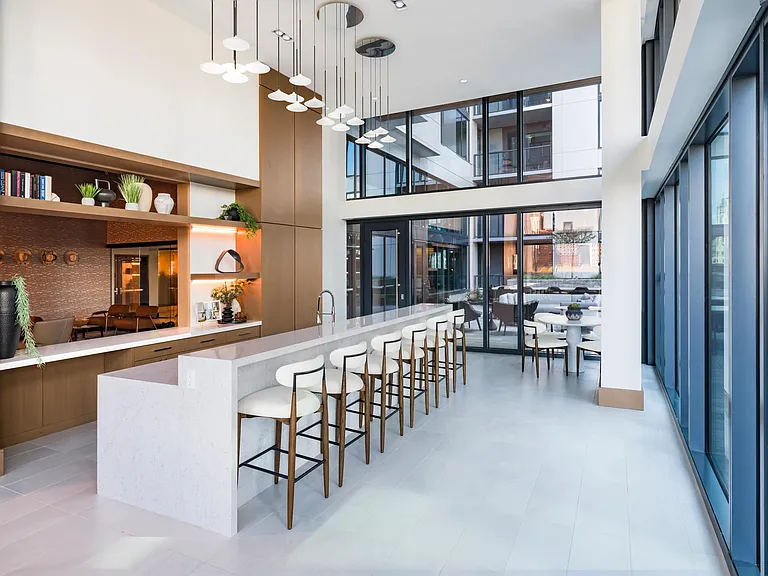 A light-filled entertaining kitchen at Modera McGavock, designed for gatherings and everyday hosting, with Nashville's dining and music close by.