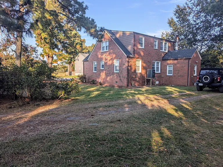 Large backyard with garage