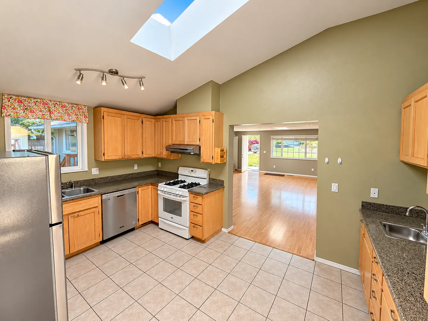 3BD|2BA - Home with Skylights, Updated Kitchen, and Private Outdoor Space — Photo 3