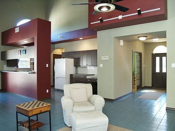 Modern, clean lines in kitchen and living areas.