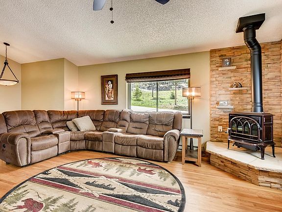 The wood burning stove helps keep utility bills low in the winter.