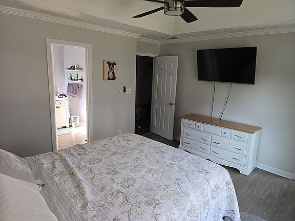 Master bedroom with entrance to en suite bath