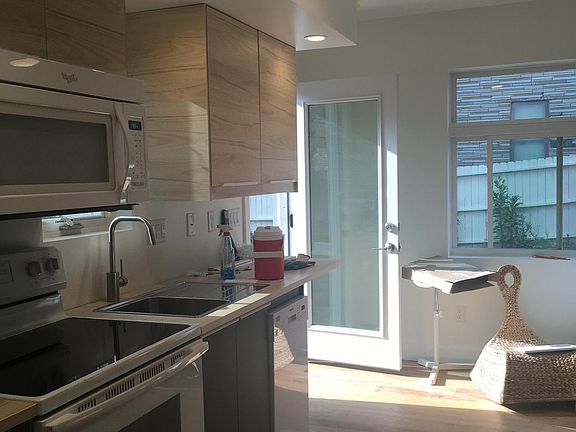 Brand New IKEA kitchen with electric stove, DW, microwave.