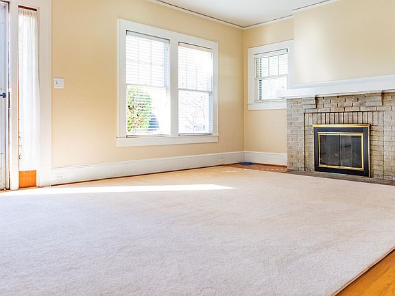 Family room with optional rug. Gas fireplace