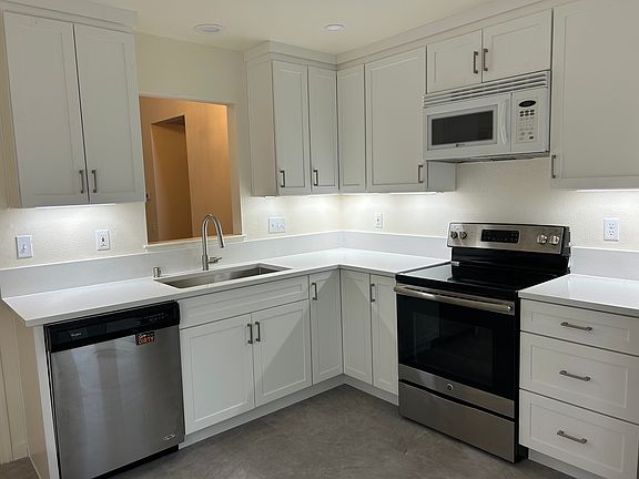 Kitchen with modern cabinets and countertops