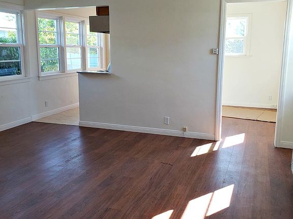 Living room feauring bank of windows
