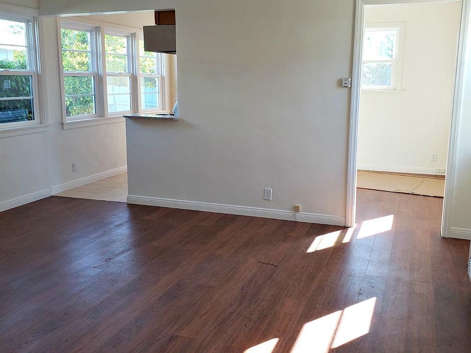 Living room feauring bank of windows