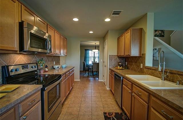 Kitchen area featuring stainless steel appliances