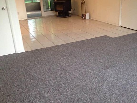 standing at front door looking in