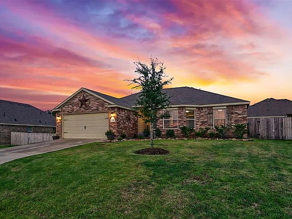Home sits on a spacious lot and is fully fenced.