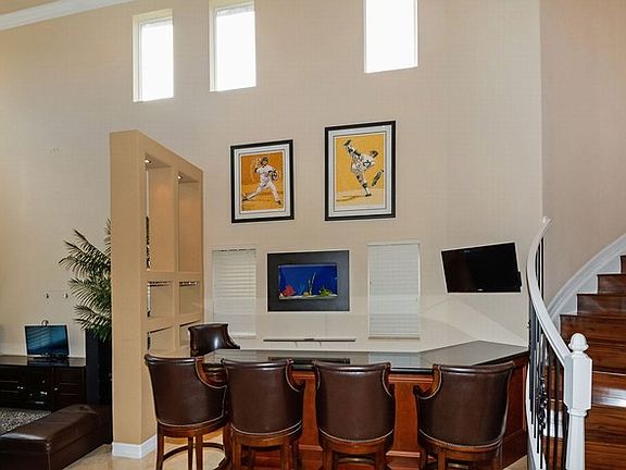 LIVING WITH CUSTOM BAR