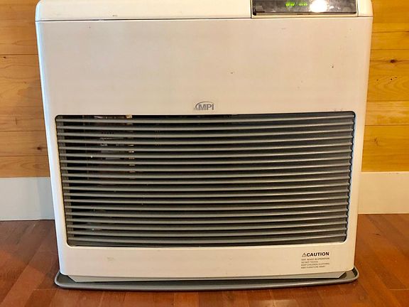 Low cost heating with propane monitor.