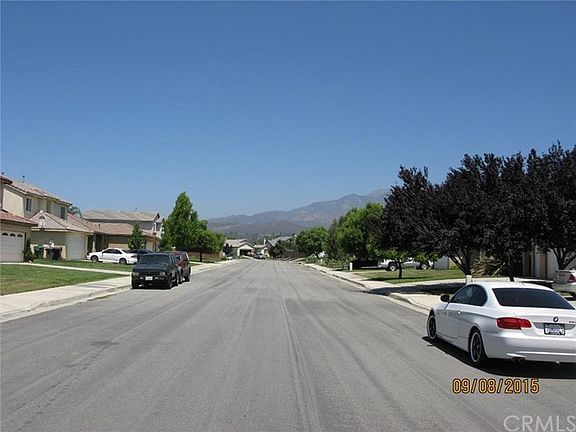 Street View looking North to the mountains. Tree-lined street. Central location close to schools, sh