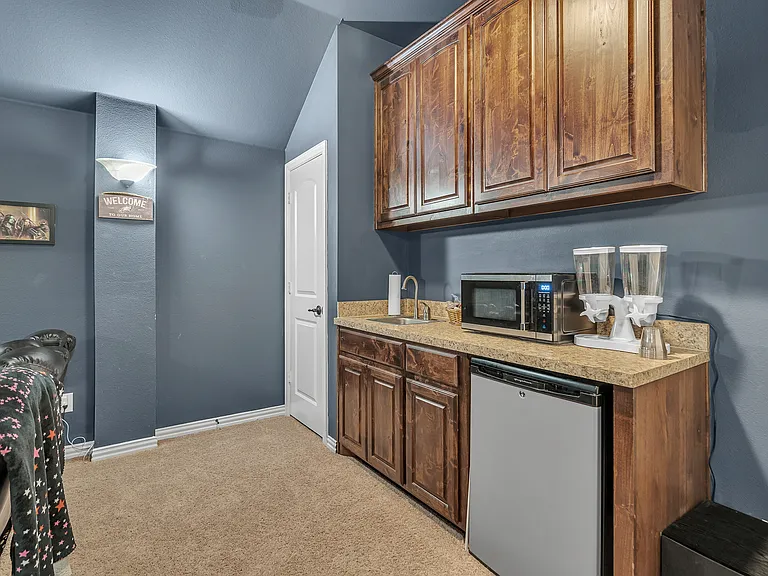Fully Furnished Media Room with Projector, Seats, Wet Bar, Microwave and Minifridge