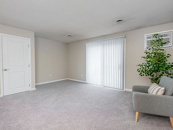 Step into spacious living areas with plush carpeting or wood-style floors and sliding doors to your private balcony (in select homes).