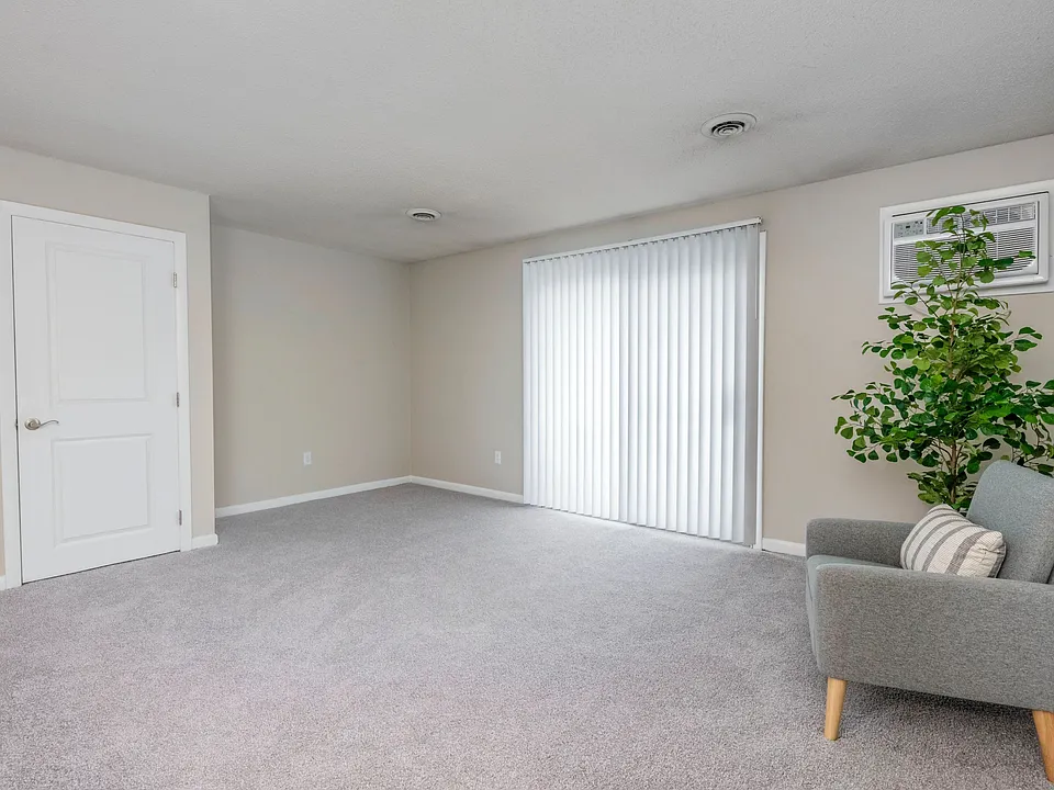 Step into spacious living areas with plush carpeting or wood-style floors and sliding doors to your private balcony (in select homes).