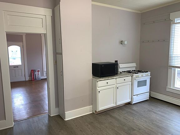 Rest of kitchen with doorway back into living room
