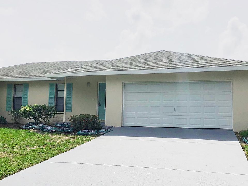 Front View. Newly Decorated. Tile throughout. Ready for move
