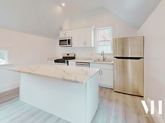 Four Bedroom | Fully Remodeled Interior, Hardwood Floors, Washer & Dryer, Stainless Appliances, Air Conditioned, Private Balcony, LARGE Floorplan!