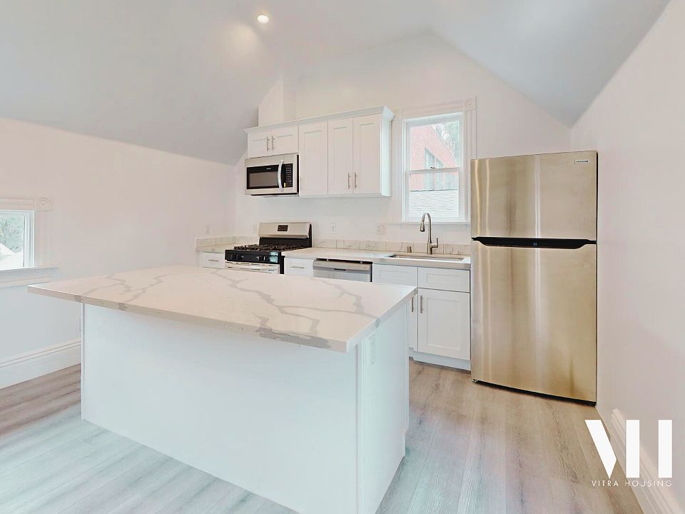 Four Bedroom | Fully Remodeled Interior, Hardwood Floors, Washer & Dryer, Stainless Appliances, Air Conditioned, Private Balcony, LARGE Floorplan!