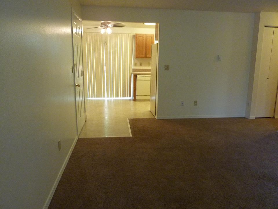 LIVING ROOM LOOKING INTO DINING ROOM