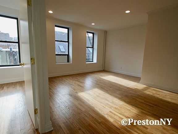5th image of 299 E 8th St APT 24