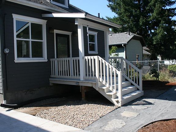 Rear view of the house with covered porch.