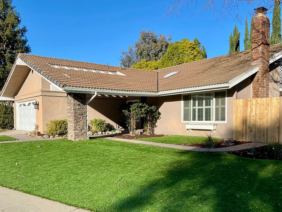 Welcome to your dream home in Westlake Village _ quiet cul-de-sac, lush lawn, and timeless curb appeal