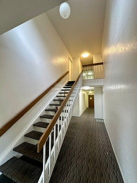 Hallway of Building 2163- E is up the stairs on the left