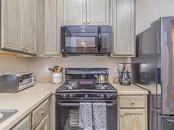 4th image of 5212 Avenue O 1/2