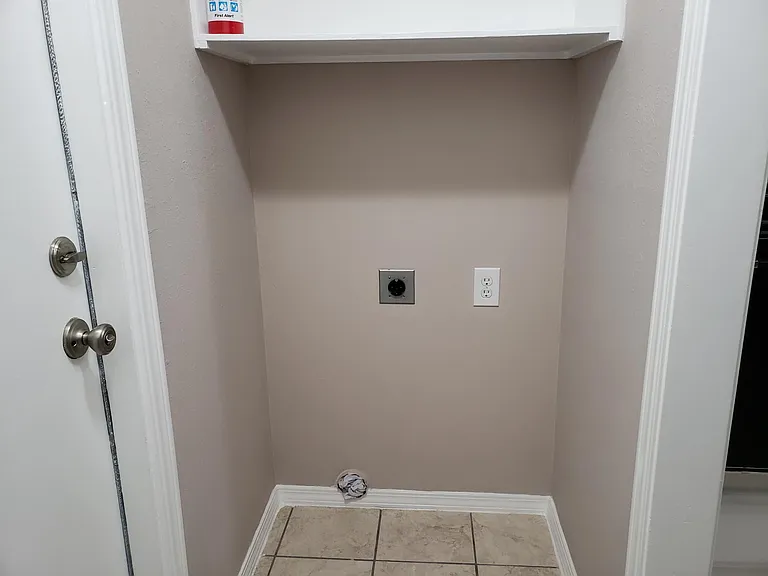 Dryer hookup area.
