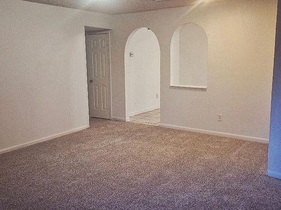 View from living area to kitchen and hall