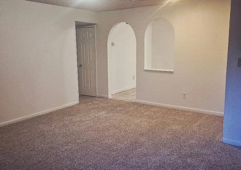 View from living area to kitchen and hall