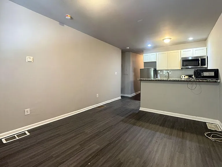 6047 Delancey St — Photo 7