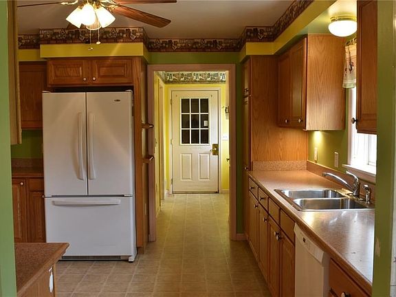 Kitchen (view 2-of-4), looking back on mudroom/ laundry area.